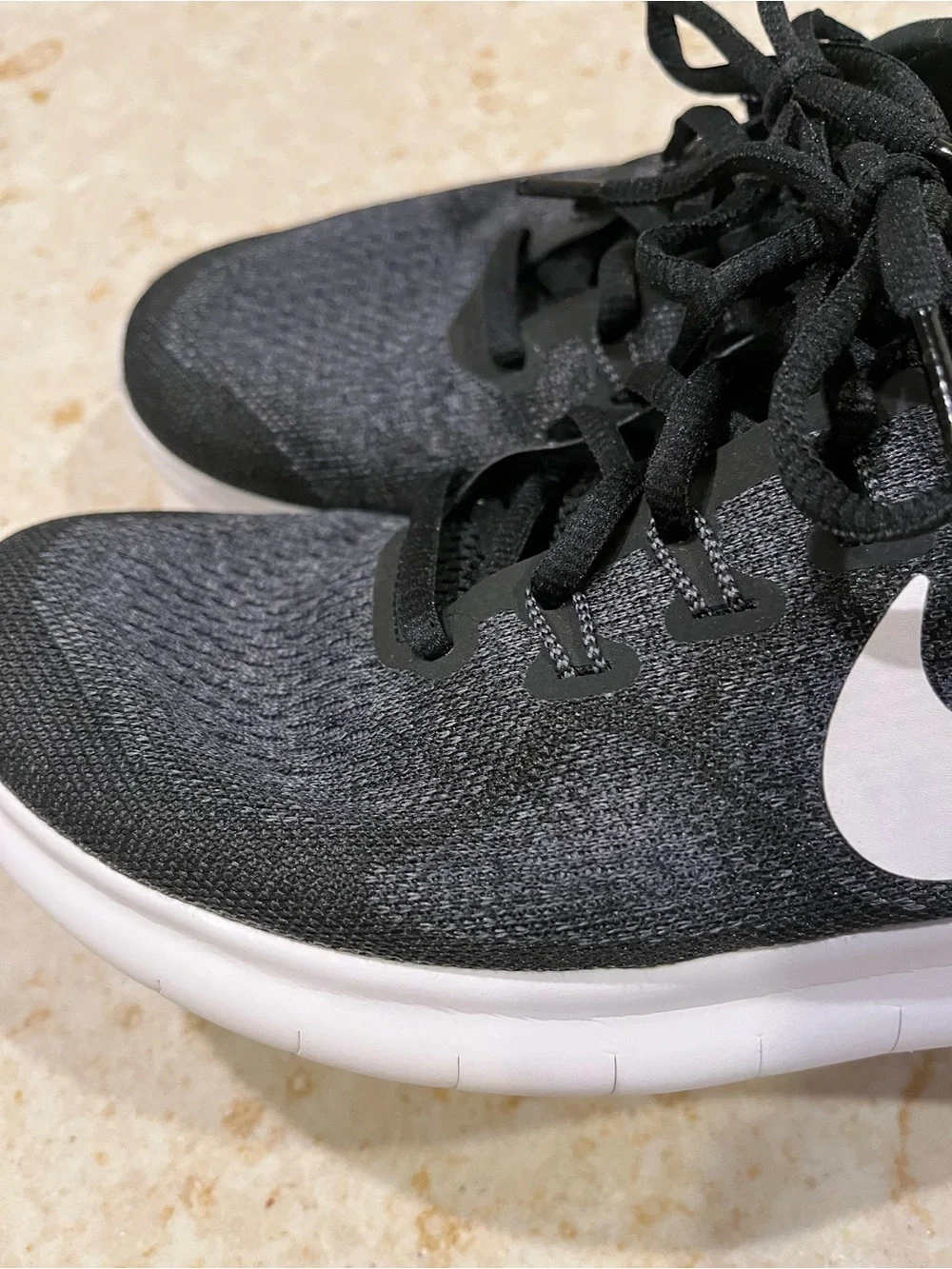 Nike  free women Black/White Running Shoes with White Swoosh.